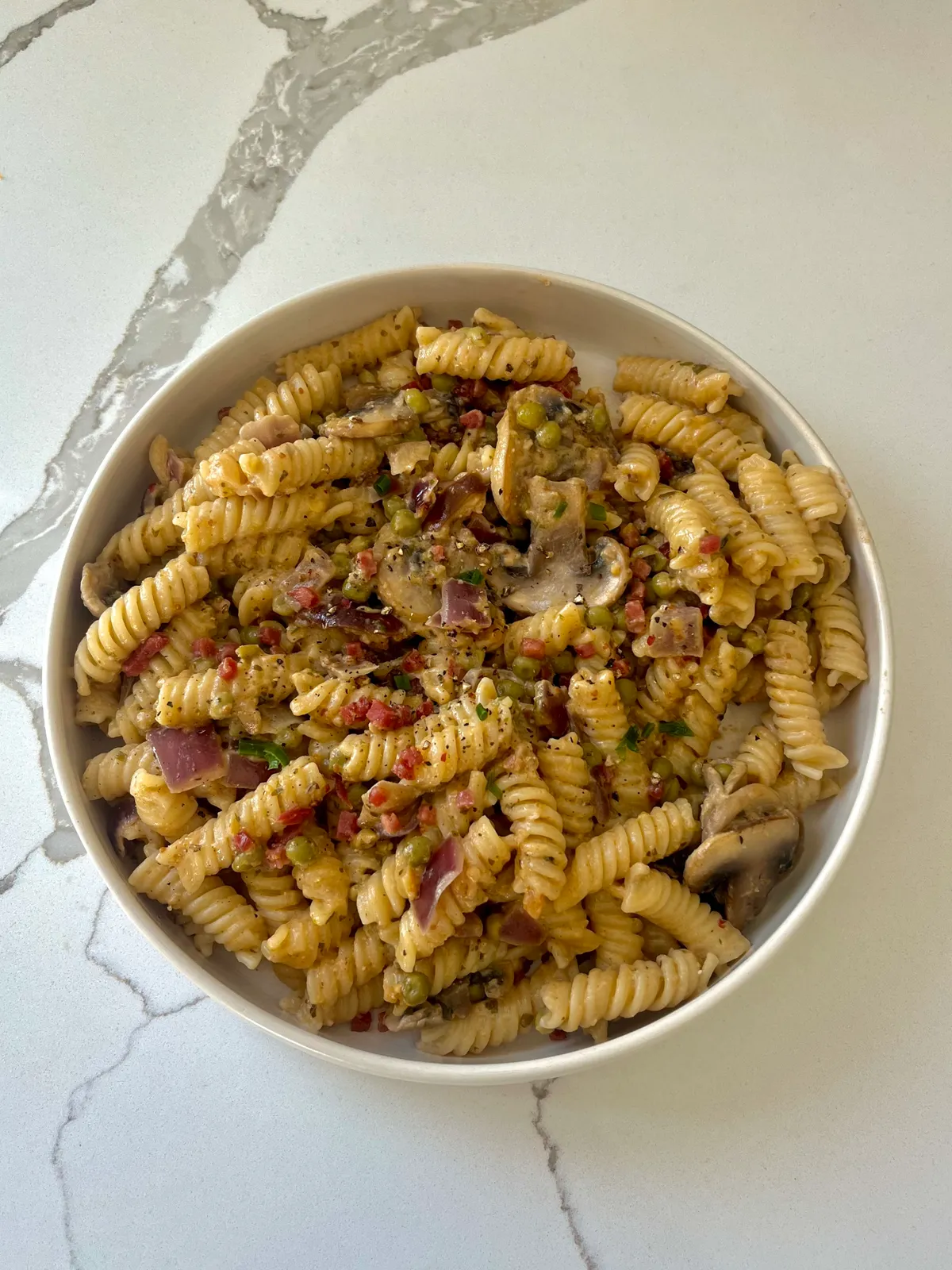 Pasta mit Champignon-Erbsen Sauce